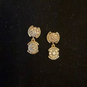 Gold and diamond earrings.